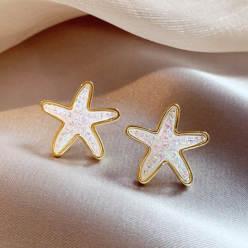 Star earrings, women's light luxury high-end earrings, 2024 new popular item, niche unique design earrings