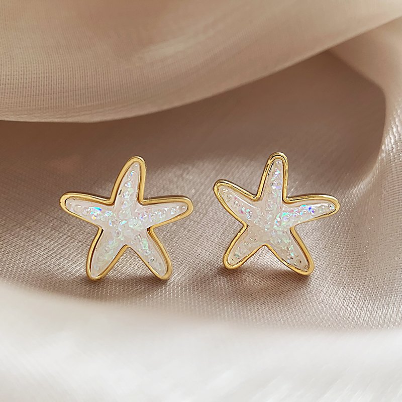 Star earrings, women's light luxury high-end earrings, 2024 new popular item, niche unique design earrings