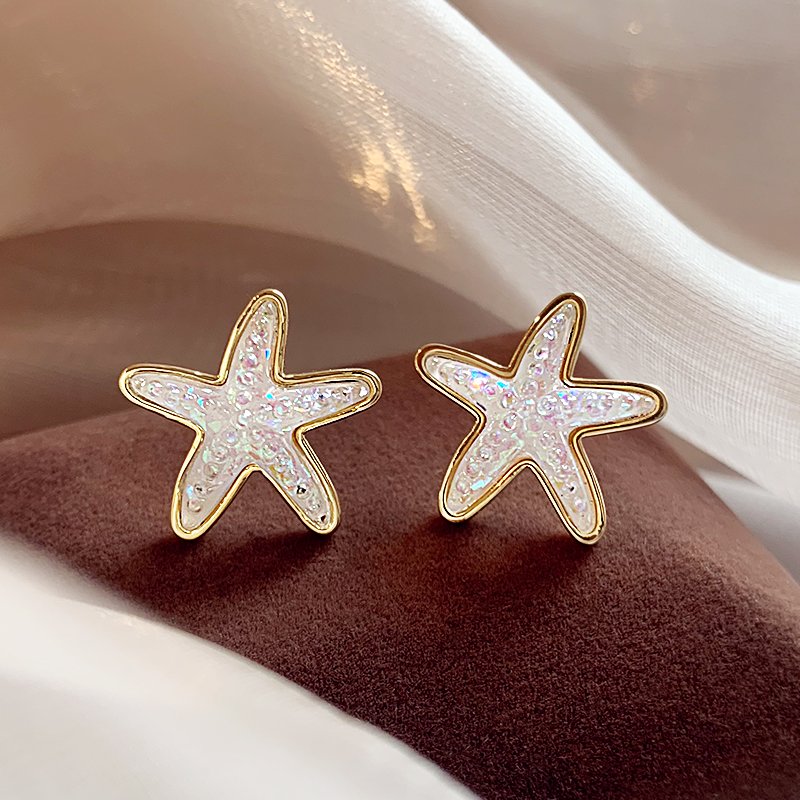 Star earrings, women's light luxury high-end earrings, 2024 new popular item, niche unique design earrings