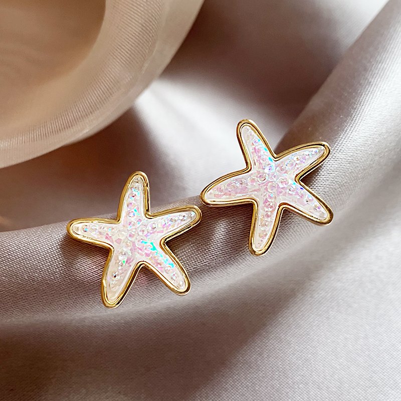 Star earrings, women's light luxury high-end earrings, 2024 new popular item, niche unique design earrings