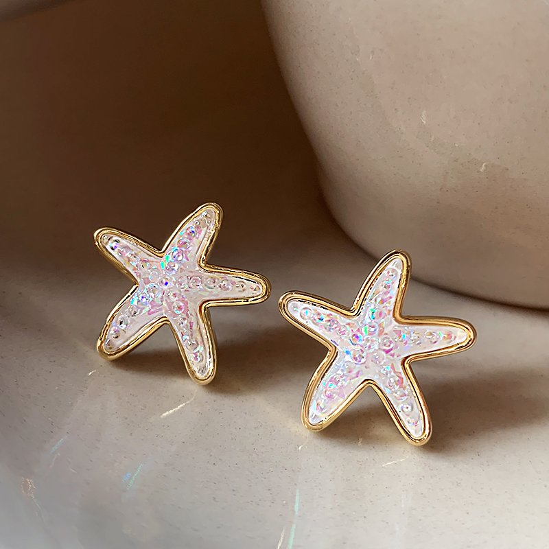 Star earrings, women's light luxury high-end earrings, 2024 new popular item, niche unique design earrings