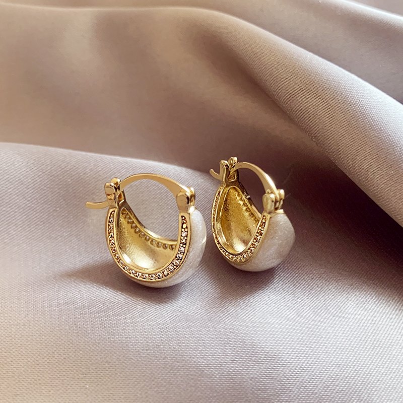 White glazed zirconium inlaid earrings for women, with a light luxury and high-end temperament. 2024 new popular and unique earring earrings