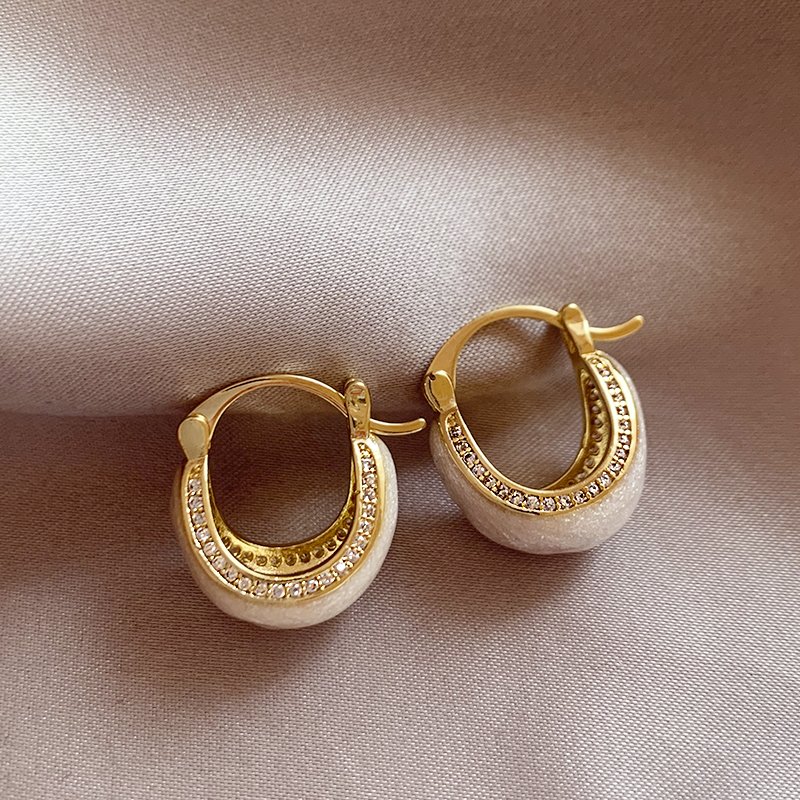 White glazed zirconium inlaid earrings for women, with a light luxury and high-end temperament. 2024 new popular and unique earring earrings