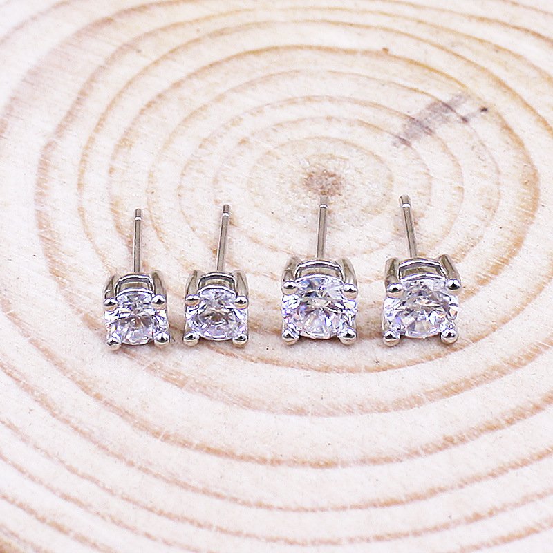 S925 pure silver four claw earrings for women, simple and popular, sweet earrings, mini and compact ear buckles, elegant zircon earrings