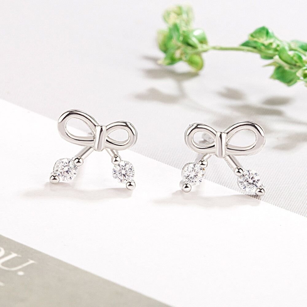 S925 sterling silver bow earrings for women, versatile and simple, with small tassel earrings that do not fade. Earrings buckle