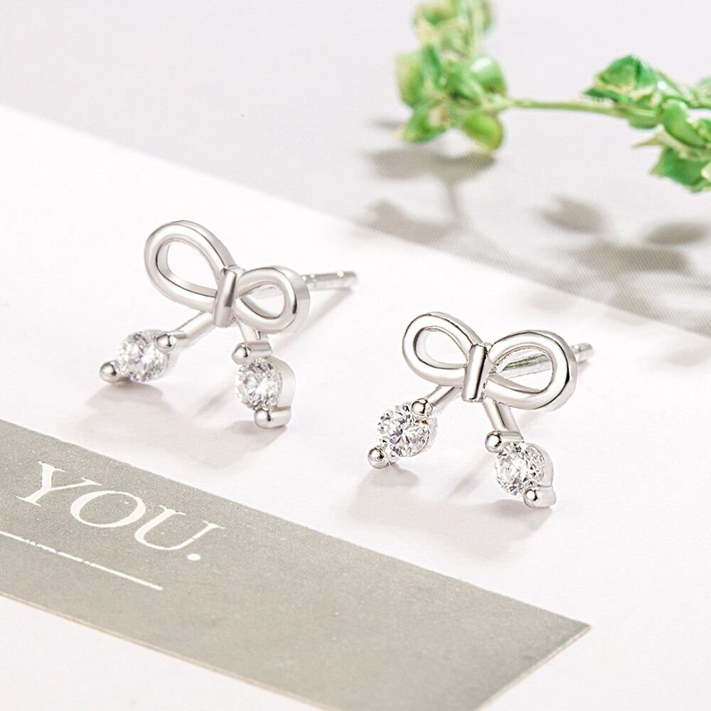 S925 sterling silver bow earrings for women, versatile and simple, with small tassel earrings that do not fade. Earrings buckle