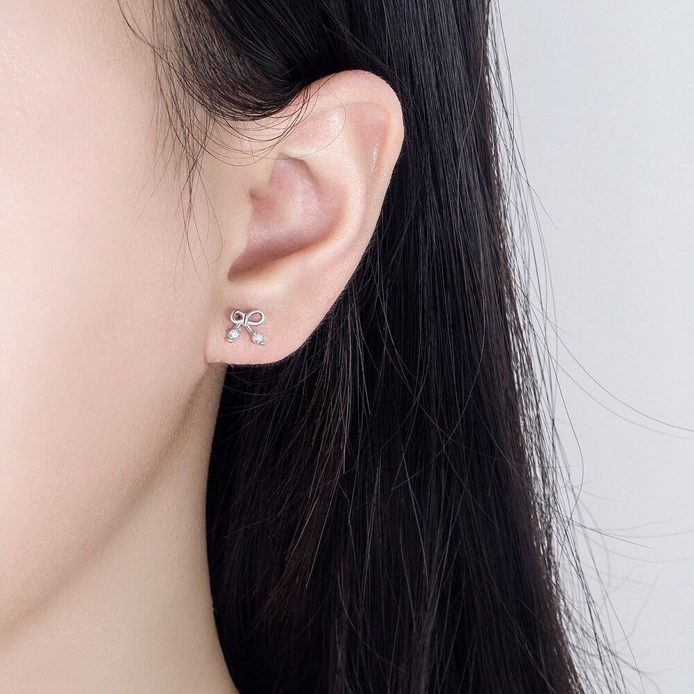 S925 sterling silver bow earrings for women, versatile and simple, with small tassel earrings that do not fade. Earrings buckle