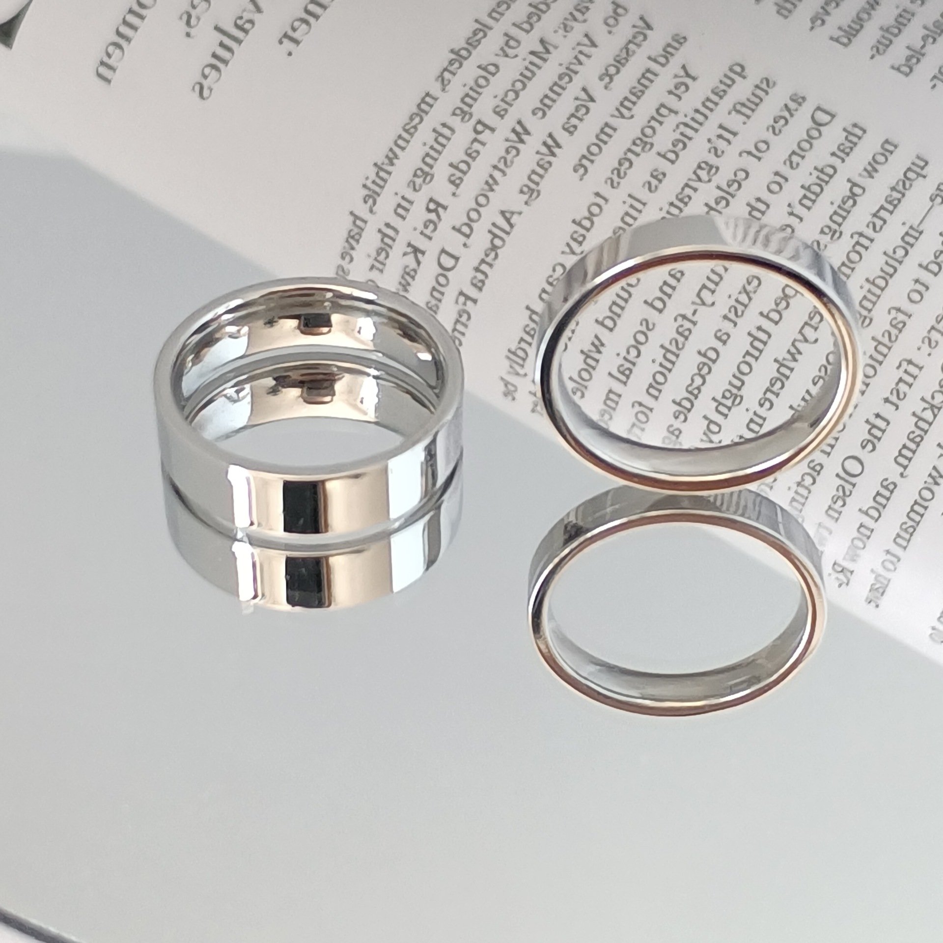 European and American new fashionable simple smooth titanium steel ring with engraved flat stainless steel couple ring that does not fade for women