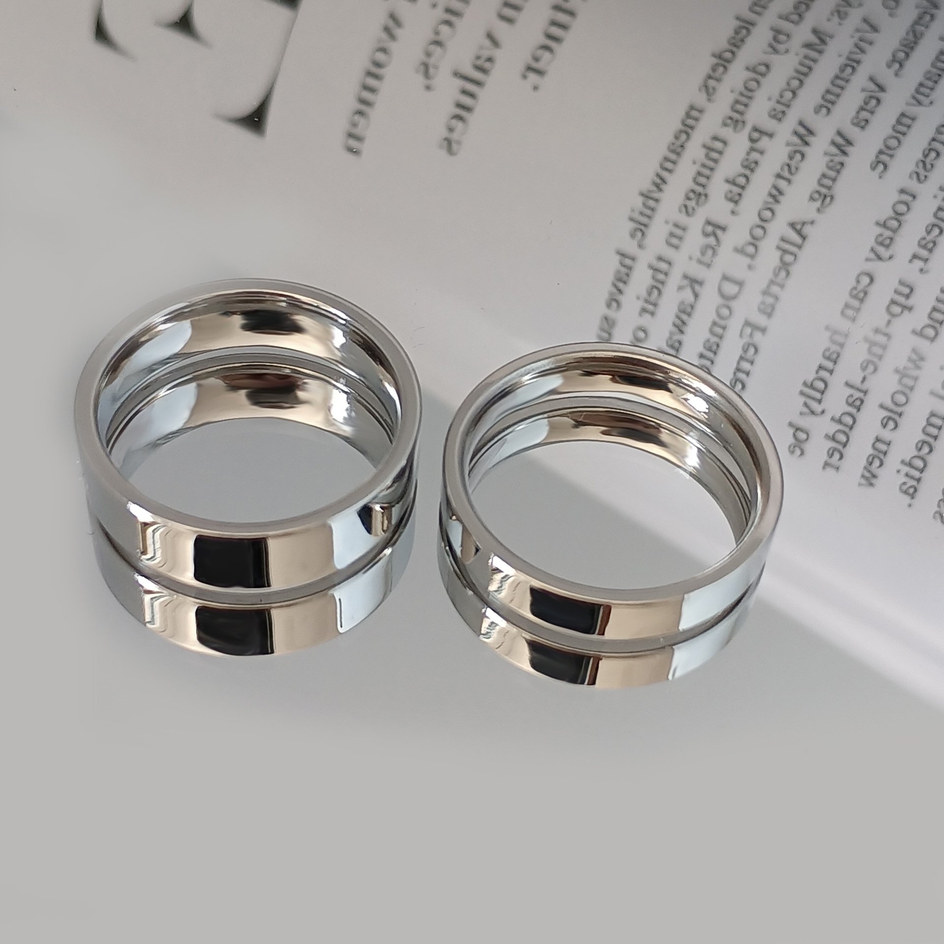 European and American new fashionable simple smooth titanium steel ring with engraved flat stainless steel couple ring that does not fade for women