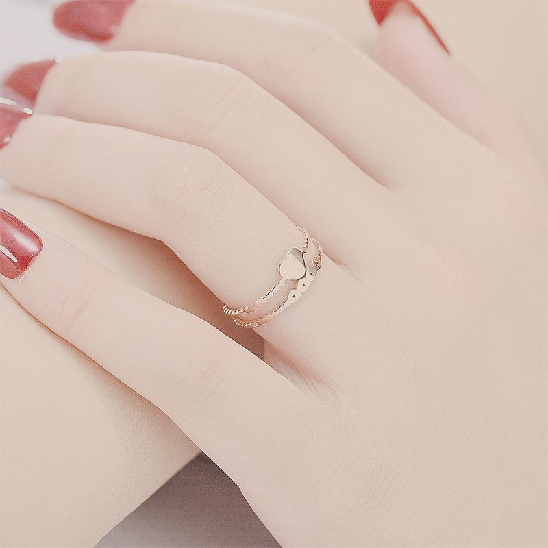 Korean version of light luxury design with a stylish opening titanium steel ring, women's European and American niche ring jewelry