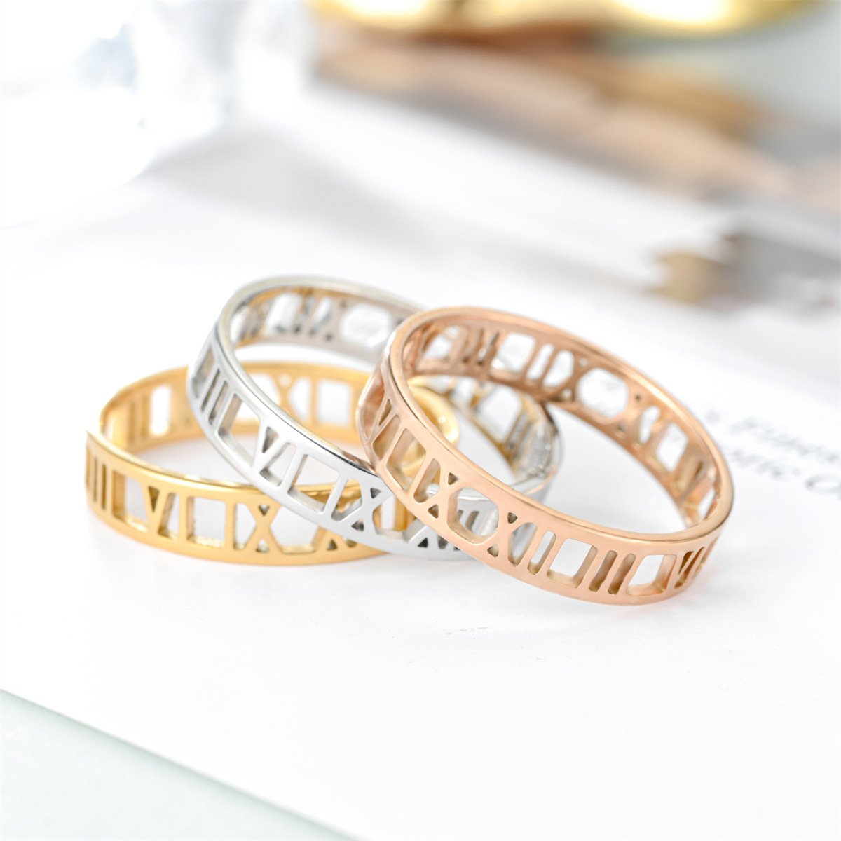 Spot women's light luxury style Roman digital titanium steel ring rose gold European and American popular women's tricolor ring