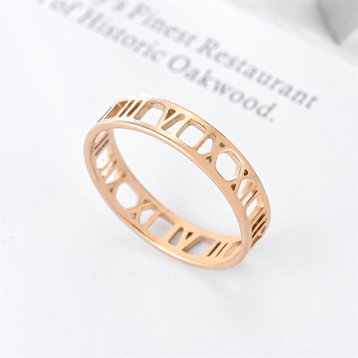 Spot women's light luxury style Roman digital titanium steel ring rose gold European and American popular women's tricolor ring