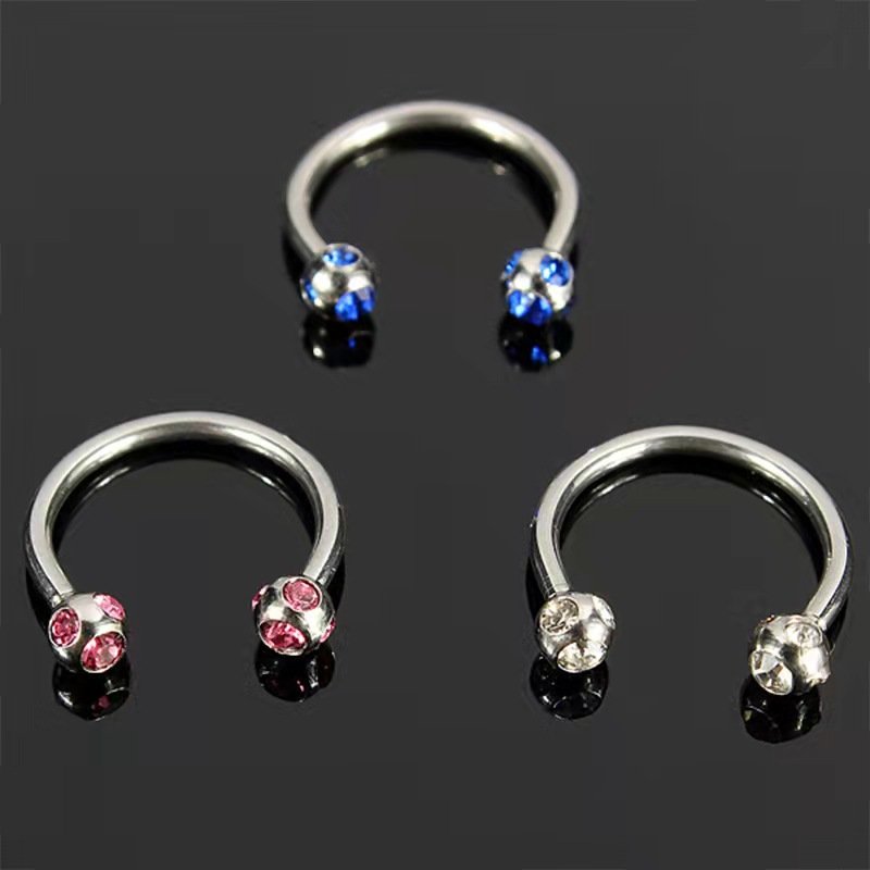 Stainless steel perforated rhinestone horseshoe shaped nose ring, lip rod earrings, versatile rings, European and American puncture jewelry