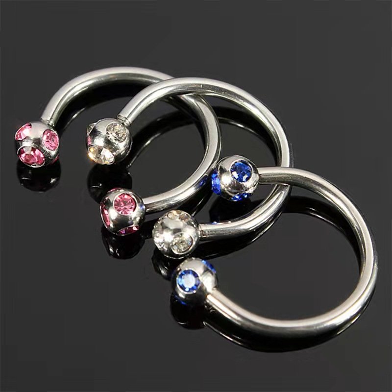 Stainless steel perforated rhinestone horseshoe shaped nose ring, lip rod earrings, versatile rings, European and American puncture jewelry