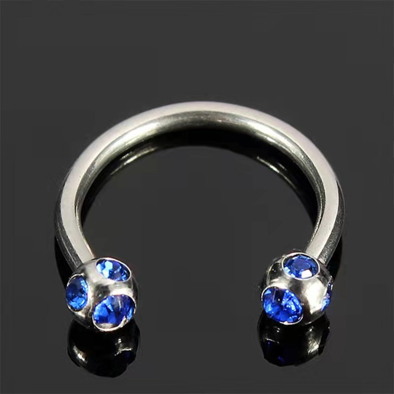 Stainless steel perforated rhinestone horseshoe shaped nose ring, lip rod earrings, versatile rings, European and American puncture jewelry