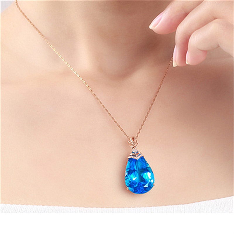 Large naked stone pear shaped sapphire pendant, sapphire crystal collarbone chain, rose gold topaz necklace