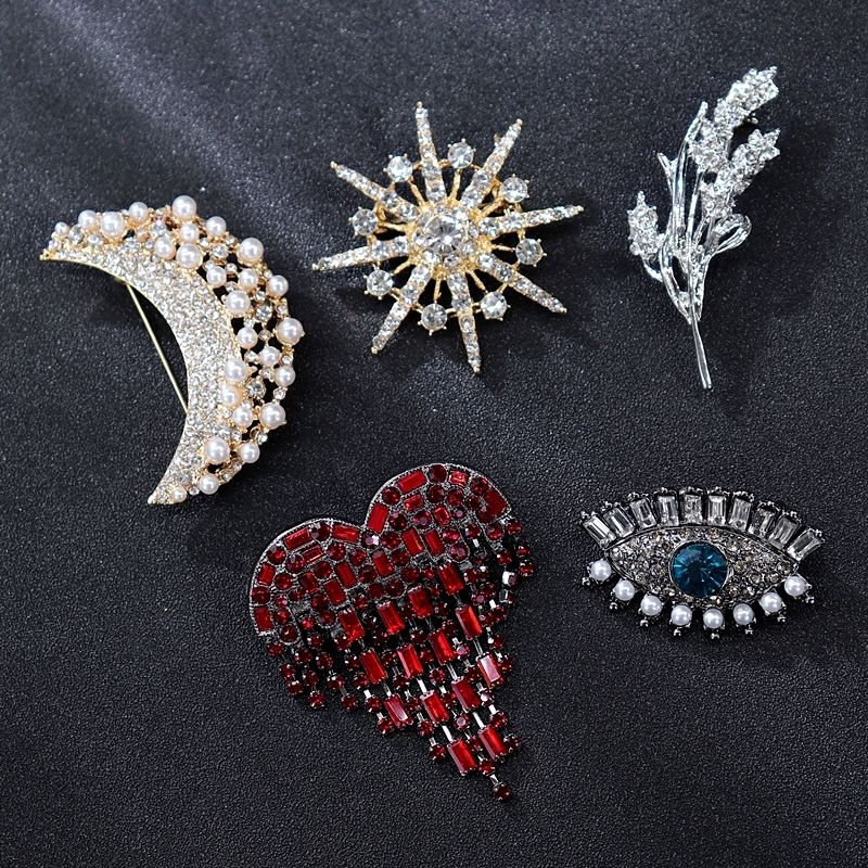 Various pearl, crystal, sapphire, luxurious diamond studded brooch, chest flower