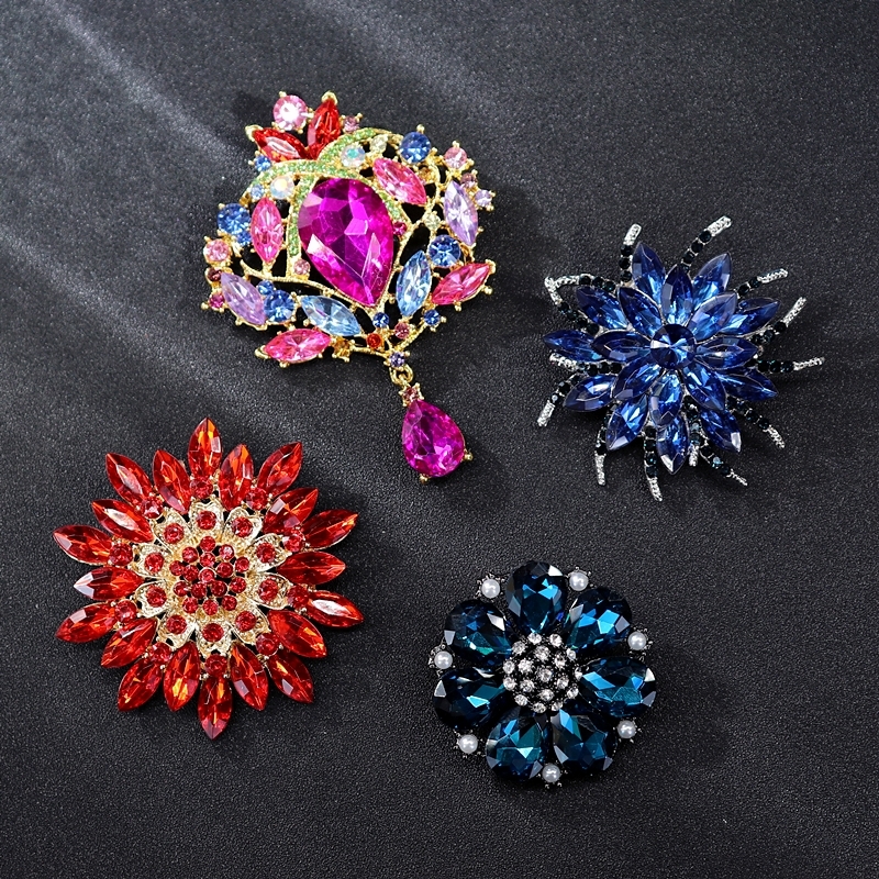 Various pearl, crystal, sapphire, luxurious diamond studded brooch, chest flower