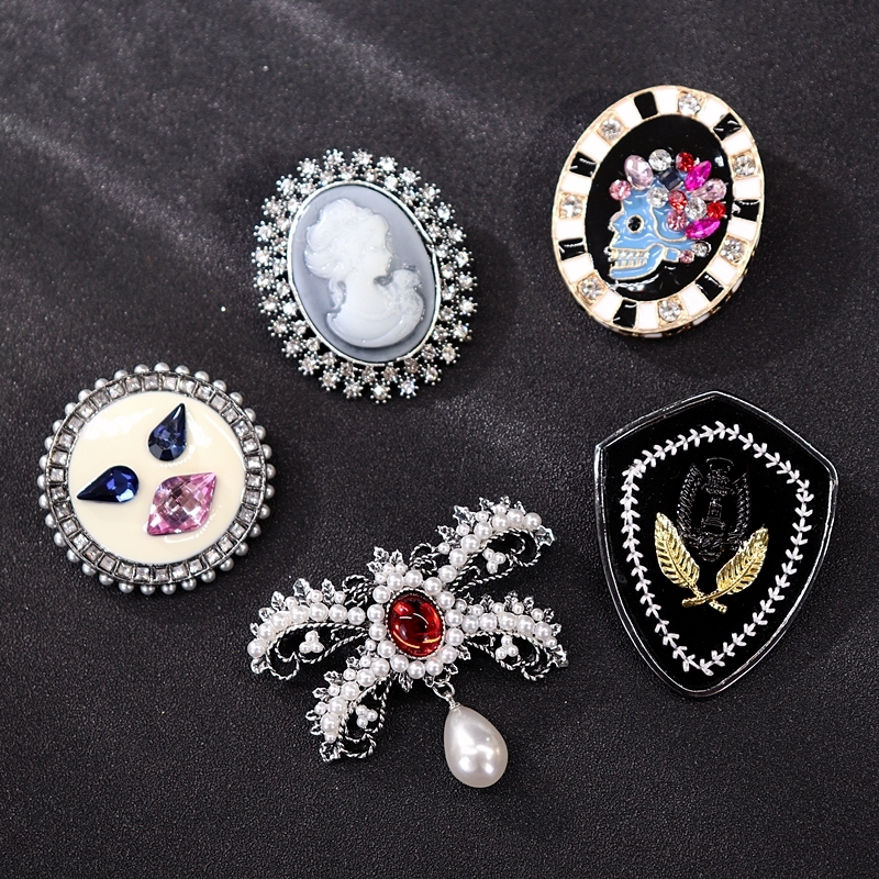 Various pearl, crystal, sapphire, luxurious diamond studded brooch, chest flower