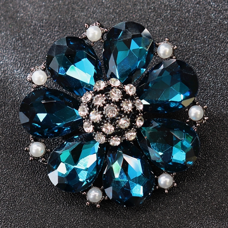 Various pearl, crystal, sapphire, luxurious diamond studded brooch, chest flower