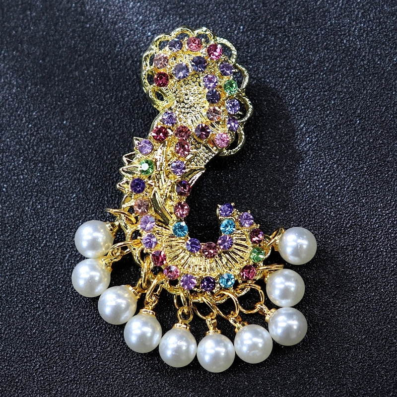 Various pearl, crystal, sapphire, luxurious diamond studded brooch, chest flower