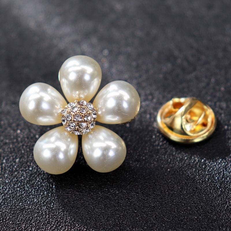 Various pearl, crystal, sapphire, luxurious diamond studded brooch, chest flower