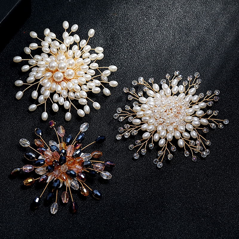 White, elegant, luxurious pearl brooch, chest flower