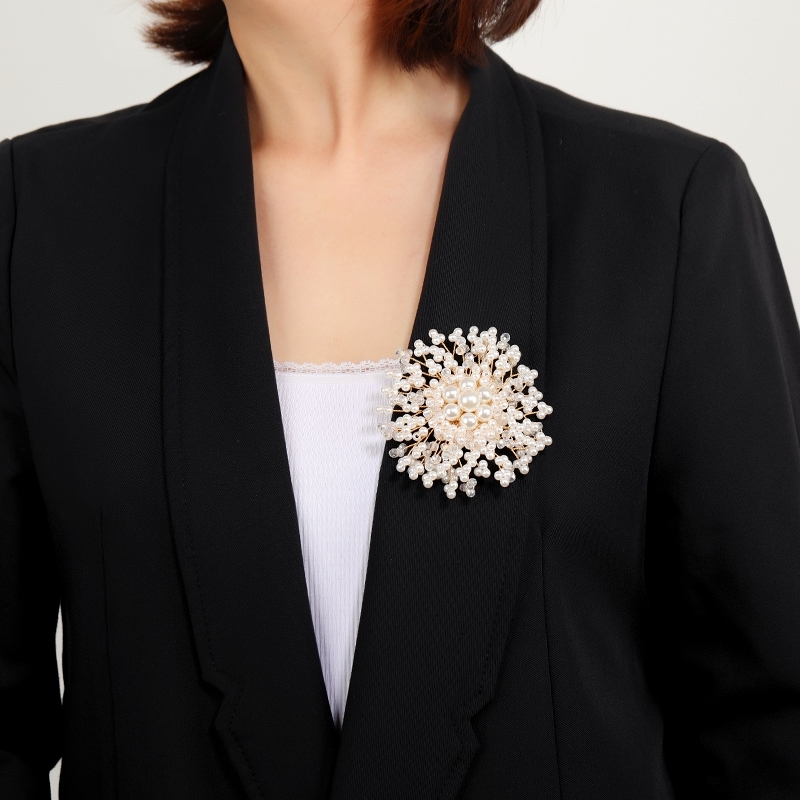 White, elegant, luxurious pearl brooch, chest flower