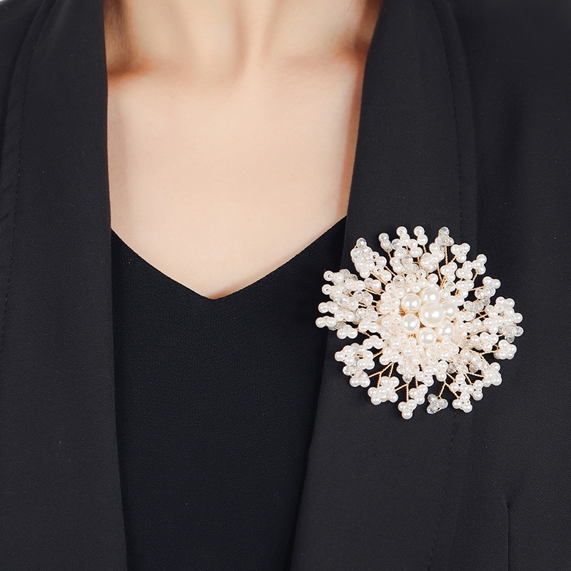 White, elegant, luxurious pearl brooch, chest flower