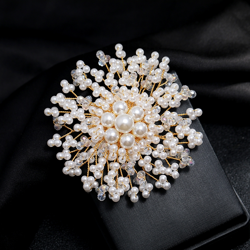 White, elegant, luxurious pearl brooch, chest flower