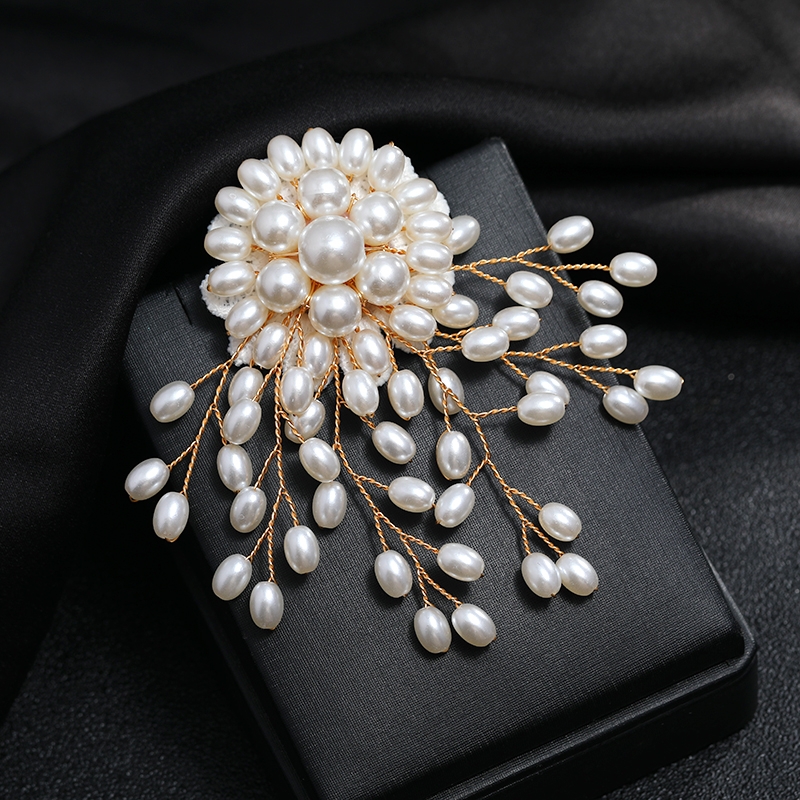 White, elegant, luxurious pearl brooch, chest flower