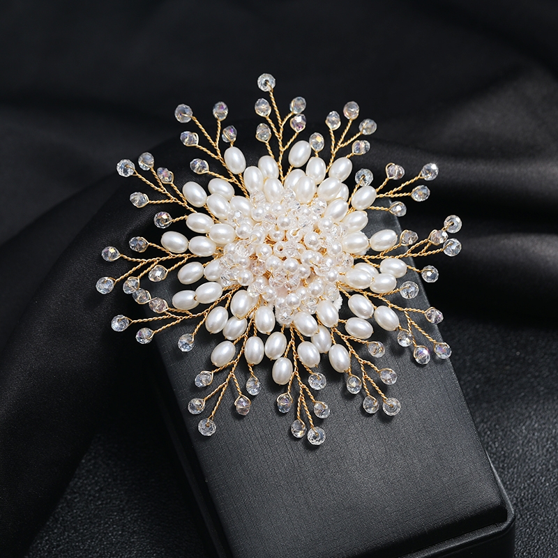 White, elegant, luxurious pearl brooch, chest flower