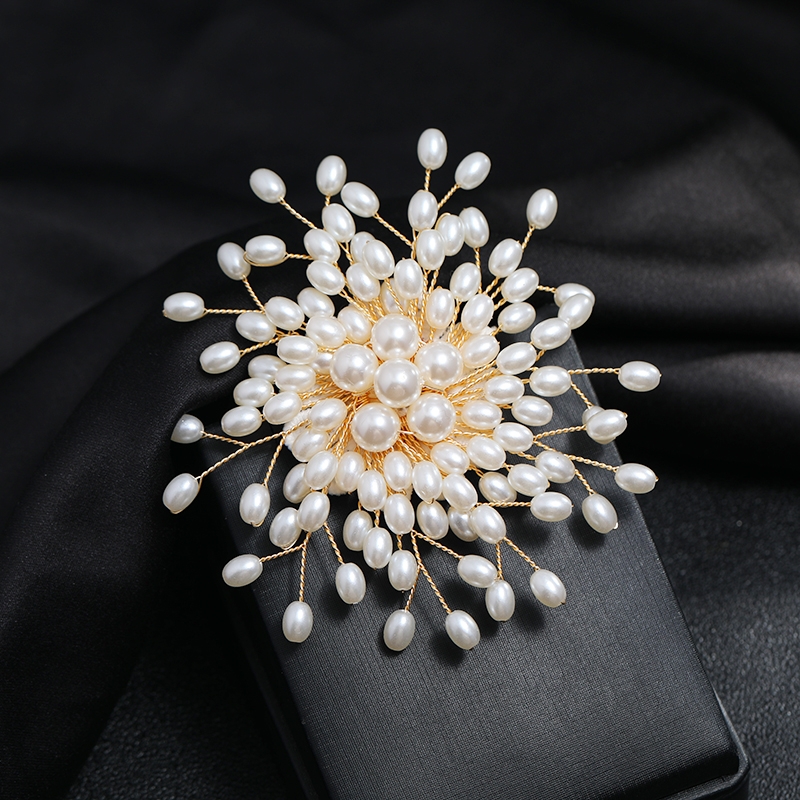 White, elegant, luxurious pearl brooch, chest flower