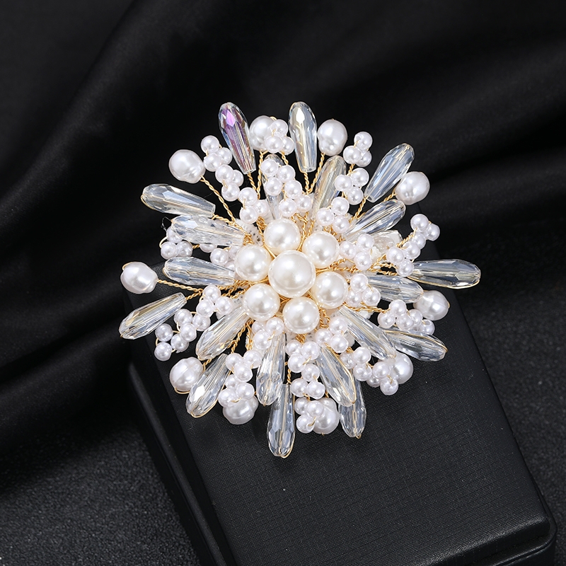 White, elegant, luxurious pearl brooch, chest flower