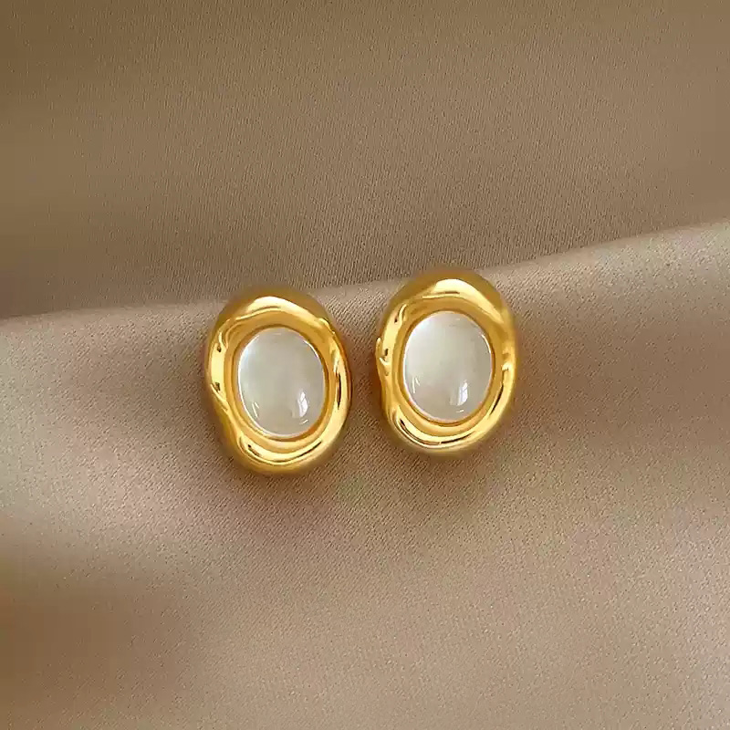 Elliptical cat eye stone earrings