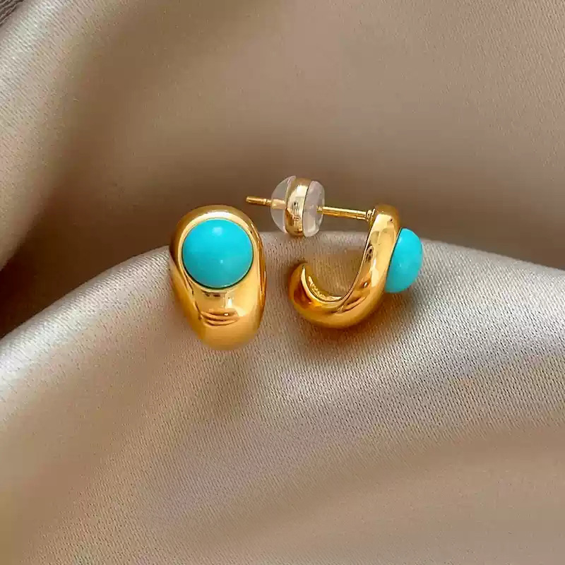 A pair of natural turquoise earrings and 925 silver stud posts