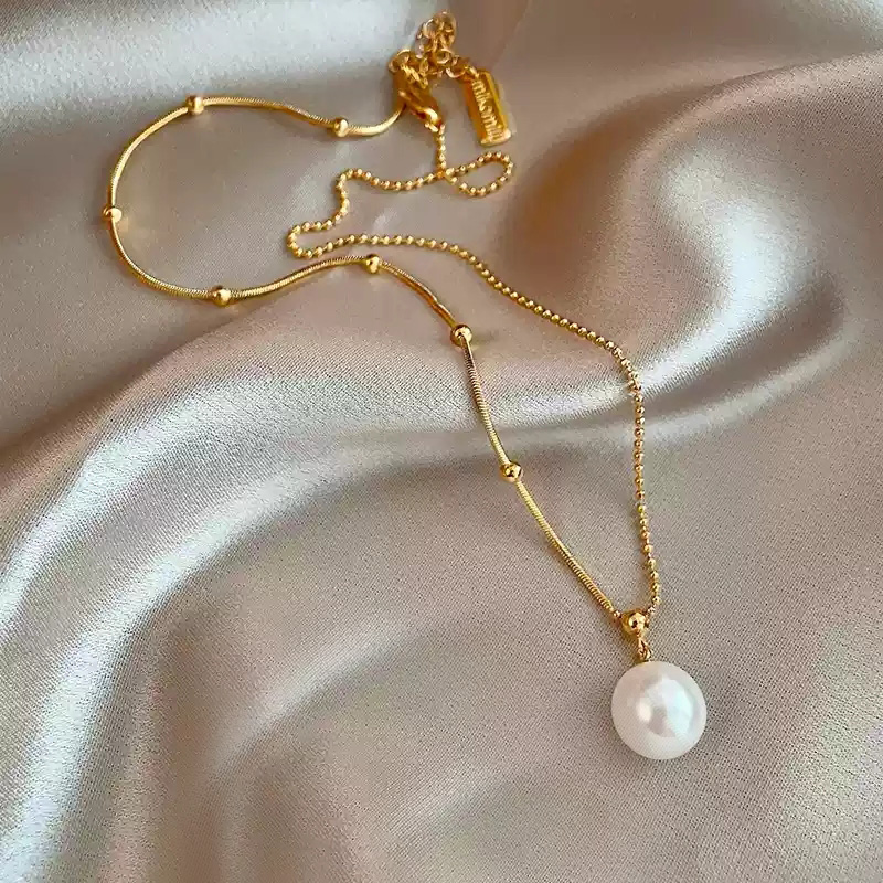 Asymmetric pearl necklace [42cm+6cm]