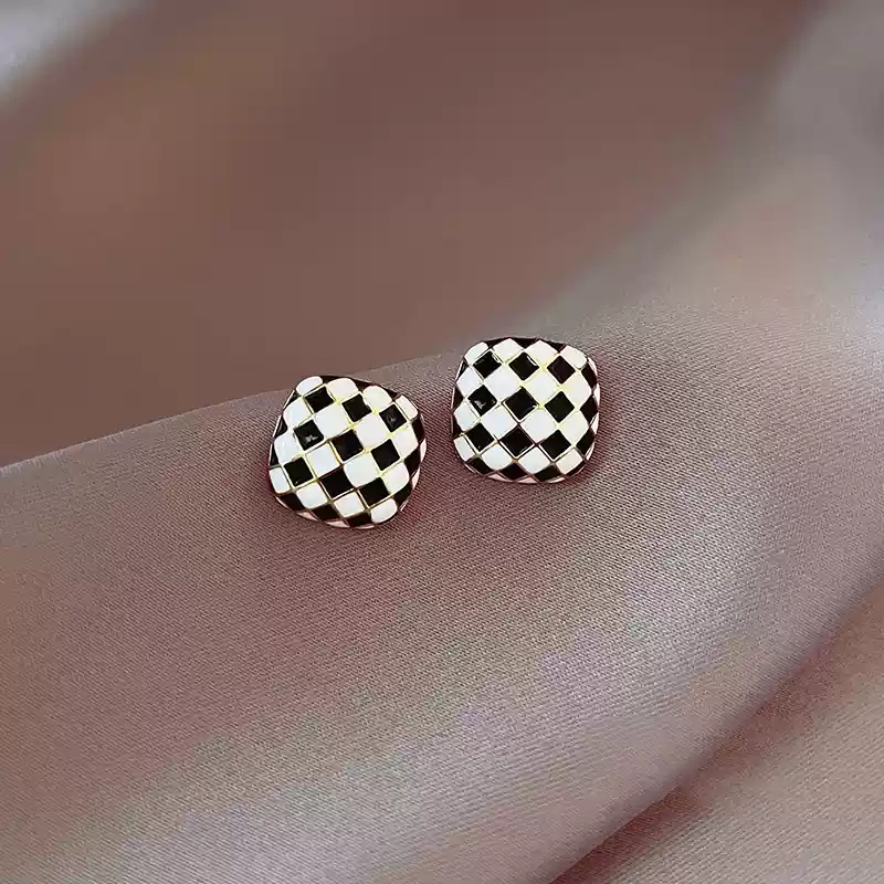 Black and white checkerboard pattern earrings