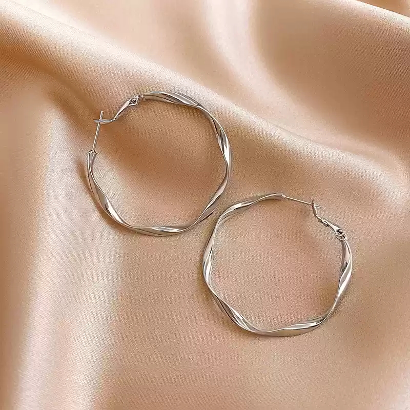 Silver spiral ear loops