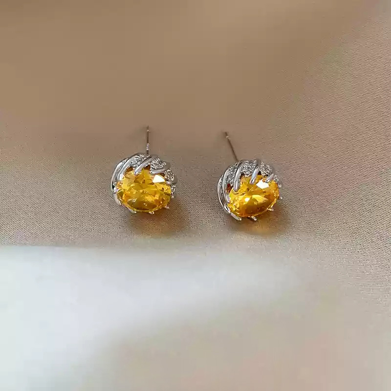 Yellow zircon earrings with temperament~