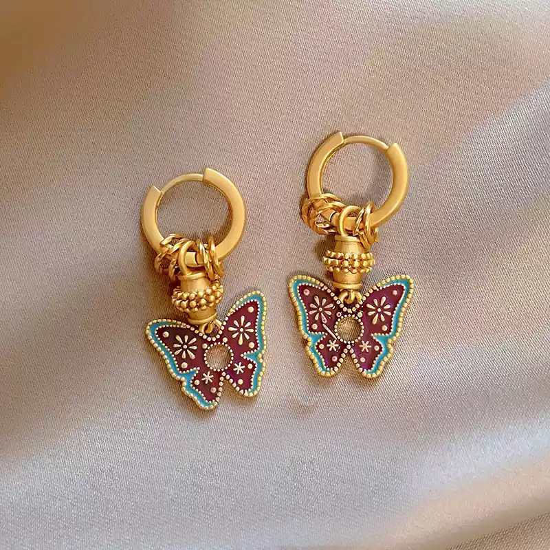 A pair of butterfly earrings