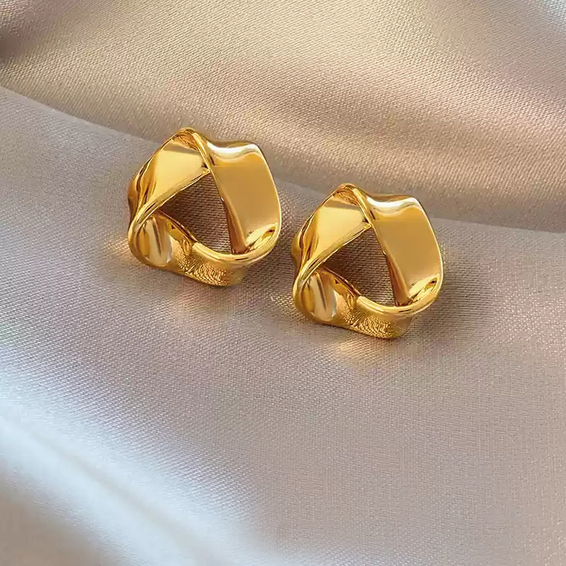 Golden triangular earrings