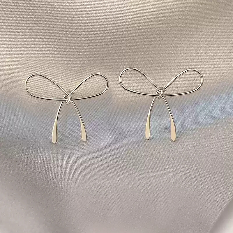 Silver bow earrings