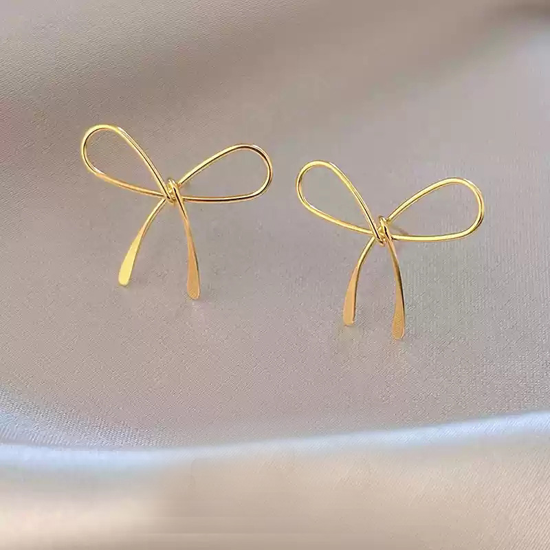 Golden bow earrings