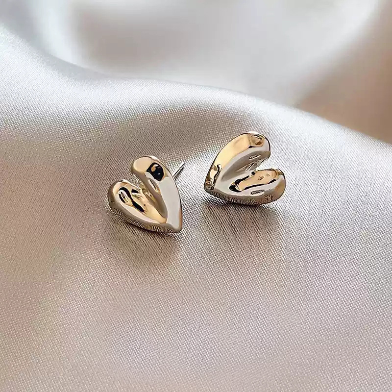 Silver textured heart-shaped earrings