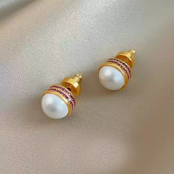 Retro pearl earrings with detailed zircon inlay