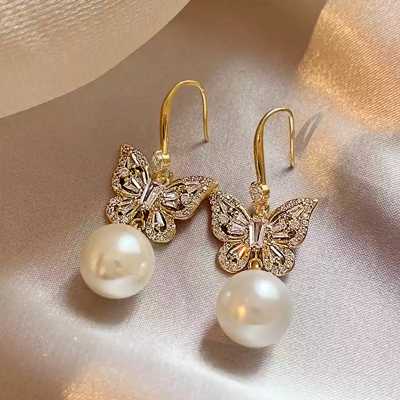 Butterfly pearl tassel earrings