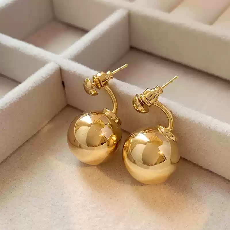 Golden round earrings