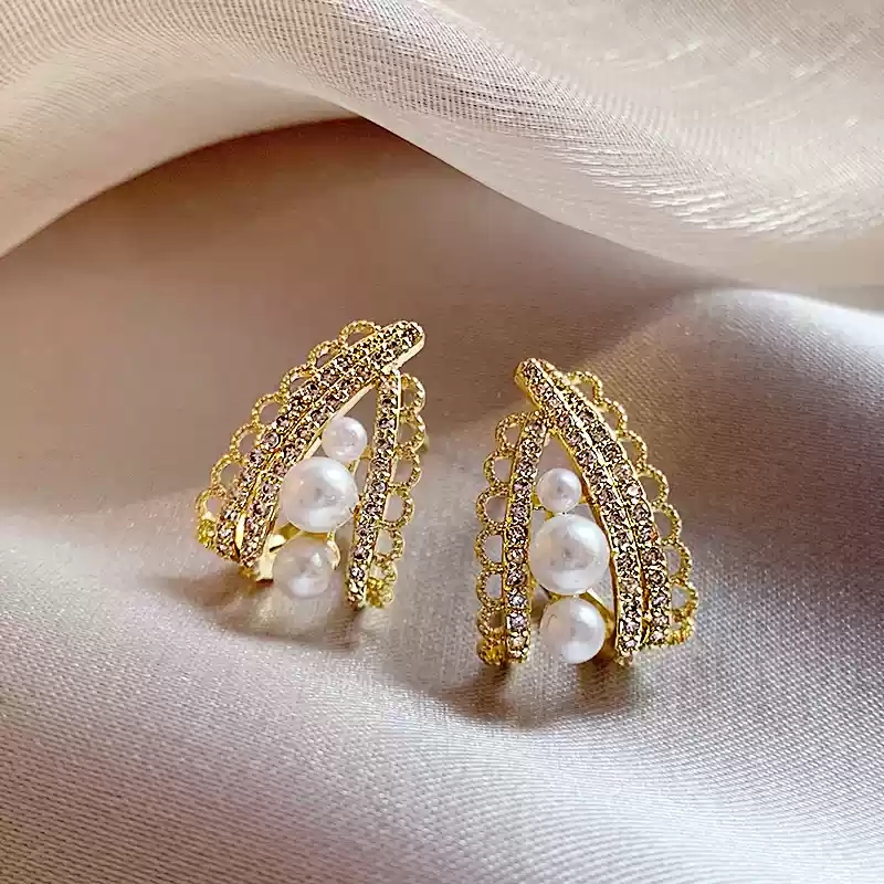 Golden diamond studded pearl earrings