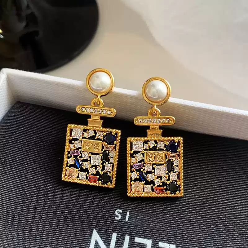 Perfume bottle pearl earrings